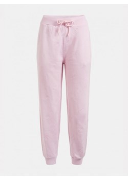 Damskie spodnie dresowe GUESS  ASTRA JOGGER ze sklepu Sportstylestory.com w kategorii Spodnie damskie - zdjęcie 135203397