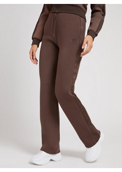 Damskie spodnie dresowe GUESS BRENDA LONG PANTS ze sklepu Sportstylestory.com w kategorii Spodnie damskie - zdjęcie 136103865
