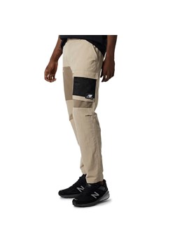 Spodnie New Balance MP21502MDY - beżowe ze sklepu streetstyle24.pl w kategorii Spodnie męskie - zdjęcie 136975635