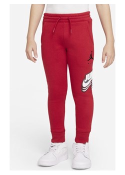 Spodnie dla małych dzieci Jordan - Czerwony ze sklepu Nike poland w kategorii Spodnie chłopięce - zdjęcie 137190468