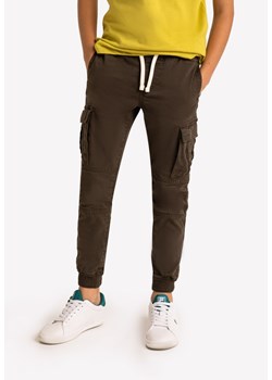 Spodnie chłopięce bojówki ze ściągaczami u dołu R-MAKS Junior ze sklepu Volcano.pl w kategorii Spodnie chłopięce - zdjęcie 140948595