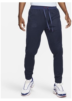 Męskie spodnie piłkarskie FC Barcelona - Niebieski ze sklepu Nike poland w kategorii Spodnie męskie - zdjęcie 141271509
