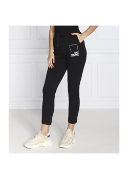 Love Moschino Spodnie dresowe | Regular Fit ze sklepu Gomez Fashion Store w kategorii Spodnie damskie - zdjęcie 142746439