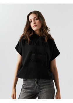 Koszulka AXMO Czarny XS ze sklepu Diverse w kategorii Bluzki damskie - zdjęcie 143603999