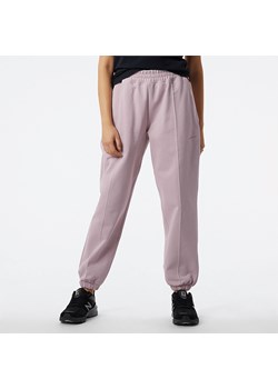 Spodnie damskie New Balance WP23553VSW – różowe ze sklepu New Balance Poland w kategorii Spodnie damskie - zdjęcie 146146836