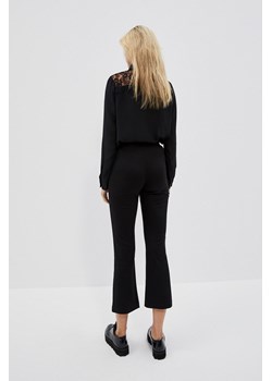 Eleganckie spodnie z nogawkami o długości 7/8 czarne ze sklepu Moodo.pl w kategorii Spodnie damskie - zdjęcie 147577577