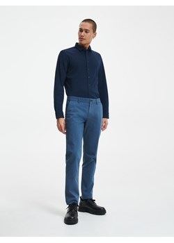 Reserved - Bawełniane chinosy - Niebieski ze sklepu Reserved w kategorii Spodnie męskie - zdjęcie 148254657