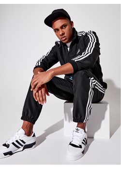 Dres męski czarny Adidas  ze sklepu MODIVO w kategorii Dresy męskie - zdjęcie 150004778