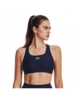 Biustonosz treningowy Under Armour UA HeatGear Mid Padless - granatowy ze sklepu Sportstylestory.com w kategorii Biustonosze - zdjęcie 151057868