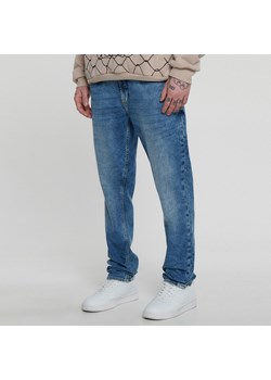 Cropp - Niebieskie jeansy męskie slim - niebieski ze sklepu Cropp w kategorii Jeansy męskie - zdjęcie 152200755