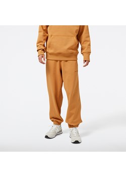 Spodnie męskie New Balance MP23551TOB – pomarańczowe ze sklepu New Balance Poland w kategorii Spodnie męskie - zdjęcie 152384015