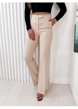 spodnie akre beżowe l/40 ze sklepu UBRA w kategorii Spodnie damskie - zdjęcie 152446909