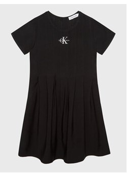 Calvin Klein Jeans Sukienka codzienna IG0IG01680 Czarny Regular Fit ze sklepu MODIVO w kategorii Sukienki dziewczęce - zdjęcie 152508925