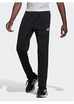 adidas Spodnie dresowe AEROREADY Game and Go Small Logo Tapered Joggers HL2180 Czarny Regular Fit ze sklepu MODIVO w kategorii Spodnie męskie - zdjęcie 152550726