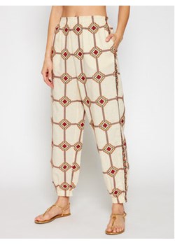 Tory Burch Spodnie materiałowe Embroidered Pull Up 83440 Beżowy Regular Fit ze sklepu MODIVO w kategorii Spodnie damskie - zdjęcie 152559878