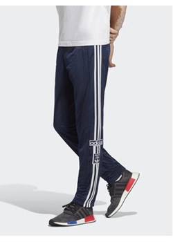 adidas Spodnie dresowe Adicolor Classics Adibreak Tracksuit Bottoms HR3366 Niebieski Regular Fit ze sklepu MODIVO w kategorii Spodnie męskie - zdjęcie 152574305