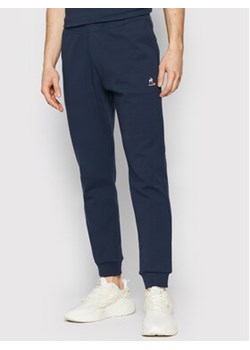 Le Coq Sportif Spodnie dresowe 2120214 Granatowy Regular Fit ze sklepu MODIVO w kategorii Spodnie męskie - zdjęcie 152574666
