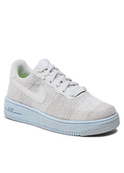 Nike Buty AF1 Crater Flyknit (GS) DH3375 101 Szary ze sklepu MODIVO w kategorii Buty sportowe damskie - zdjęcie 152619257