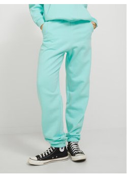 JJXX Spodnie dresowe Abbie 12223960 Zielony Loose Fit ze sklepu MODIVO w kategorii Spodnie damskie - zdjęcie 152653548