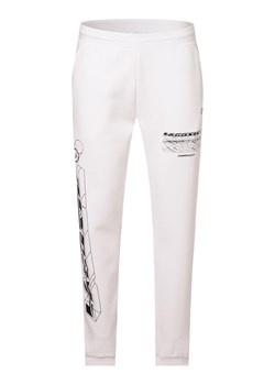 Lacoste Spodnie dresowe Mężczyźni biały nadruk ze sklepu vangraaf w kategorii Spodnie męskie - zdjęcie 152699898