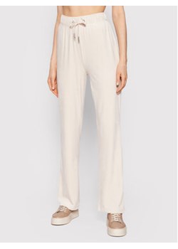 ONLY Spodnie dresowe Rebel 15266924 Beżowy Regular Fit ze sklepu MODIVO w kategorii Spodnie damskie - zdjęcie 152912747
