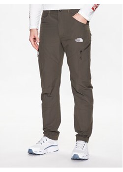The North Face Spodnie materiałowe Explo NF0A7Z96 Zielony Regular Fit ze sklepu MODIVO w kategorii Spodnie męskie - zdjęcie 153248689