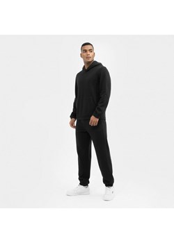 Męskie spodnie dresowe CALVIN KLEIN MEN 00GMS3P604 - czarne ze sklepu Sportstylestory.com w kategorii Spodnie męskie - zdjęcie 153388306