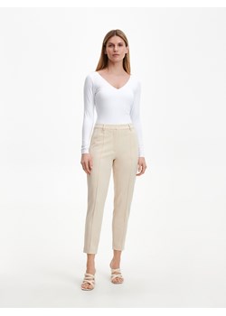 Reserved - Garniturowe spodnie - Beżowy ze sklepu Reserved w kategorii Spodnie damskie - zdjęcie 153614845