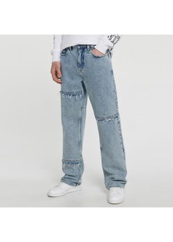 Cropp - Jasne jeansy wide leg - Niebieski ze sklepu Cropp w kategorii Jeansy męskie - zdjęcie 154176777