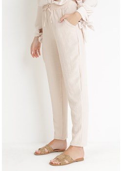 Jasnobeżowe Spodnie z Gumką w Pasie Hazele ze sklepu Born2be Odzież w kategorii Spodnie damskie - zdjęcie 154199176