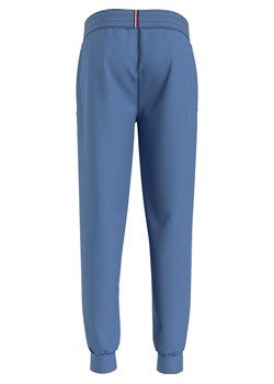 Dresowe spodnie męskie Tommy Hilfiger niebieskie UM0UM02874 ze sklepu piubiu_pl w kategorii Spodnie męskie - zdjęcie 154321797