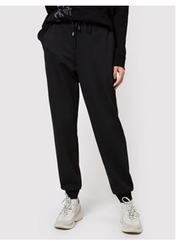 Hugo Spodnie dresowe Heleas 50442419 Czarny Regular Fit ze sklepu MODIVO w kategorii Spodnie damskie - zdjęcie 156162526