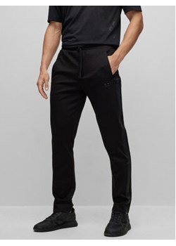 Boss Spodnie dresowe 50490725 Czarny Regular Fit ze sklepu MODIVO w kategorii Spodnie męskie - zdjęcie 156209309