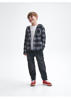 Reserved - Elastyczne jeansy relaxed - czarny ze sklepu Reserved w kategorii Spodnie chłopięce - zdjęcie 156704026
