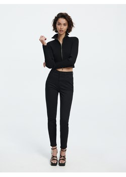 Reserved - Spodnie z połyskującymi lampasami - czarny ze sklepu Reserved w kategorii Spodnie damskie - zdjęcie 156717125