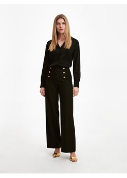 Reserved - Spodnie z ozdobnymi guzikami - Czarny ze sklepu Reserved w kategorii Spodnie damskie - zdjęcie 156731689