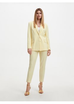 Reserved - Garniturowe spodnie - żółty ze sklepu Reserved w kategorii Spodnie damskie - zdjęcie 156824725
