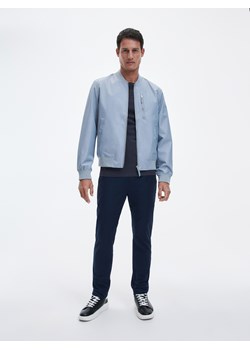 Reserved - Spodnie chino slim fit - Niebieski ze sklepu Reserved w kategorii Spodnie męskie - zdjęcie 156873565
