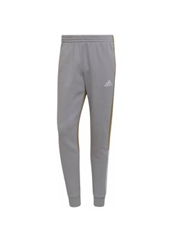 Spodnie dresowe męskie Essentials Fleece Colorblock Adidas ze sklepu SPORT-SHOP.pl w kategorii Spodnie męskie - zdjęcie 156956328