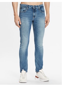 Calvin Klein Jeans Jeansy J30J323371 Niebieski Slim Fit ze sklepu MODIVO w kategorii Jeansy męskie - zdjęcie 157638889