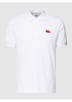 Koszulka polo z naszywką z logo LACOSTE x Netflix ze sklepu Peek&Cloppenburg  w kategorii T-shirty męskie - zdjęcie 158687157