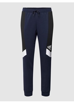 Spodnie dresowe z nadrukiem z logo ze sklepu Peek&Cloppenburg  w kategorii Spodnie męskie - zdjęcie 158718438