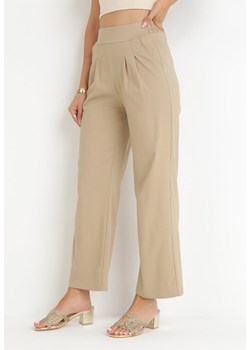 Ciemnobeżowe Szerokie Spodnie z Gumką w Pasie Migna ze sklepu Born2be Odzież w kategorii Spodnie damskie - zdjęcie 159227997