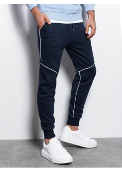 Spodnie męskie dresowe joggery z kontrastowymi elementami - granatowe V3 OM-PASK-22FW-001 ze sklepu ombre w kategorii Spodnie męskie - zdjęcie 159246219