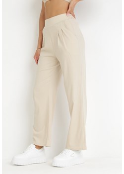 Jasnobeżowe Szerokie Spodnie z Gumką w Pasie Migna ze sklepu Born2be Odzież w kategorii Spodnie damskie - zdjęcie 160066848
