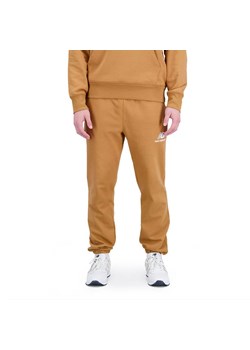 Spodnie New Balance MP31539TOB - brązowe ze sklepu streetstyle24.pl w kategorii Spodnie męskie - zdjęcie 160422449