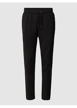 Spodnie dresowe z paskami w kontrastowym kolorze model ‘Helwyn’ ze sklepu Peek&Cloppenburg  w kategorii Spodnie męskie - zdjęcie 160642539