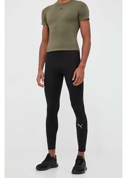 Puma legginsy do biegania Run Favorite kolor czarny gładkie ze sklepu ANSWEAR.com w kategorii Spodnie męskie - zdjęcie 161010916