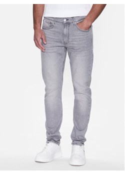 Calvin Klein Jeans Jeansy J30J322799 Szary Slim Taper Fit ze sklepu MODIVO w kategorii Jeansy męskie - zdjęcie 161199369