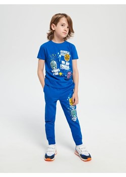 Sinsay - Spodnie dresowe jogger Transformers - niebieski ze sklepu Sinsay w kategorii Spodnie chłopięce - zdjęcie 161213837